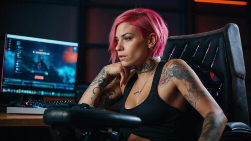 sexy inked girl gamer pink hair thinks about erotic gaming erosscia is pleasure reimagined